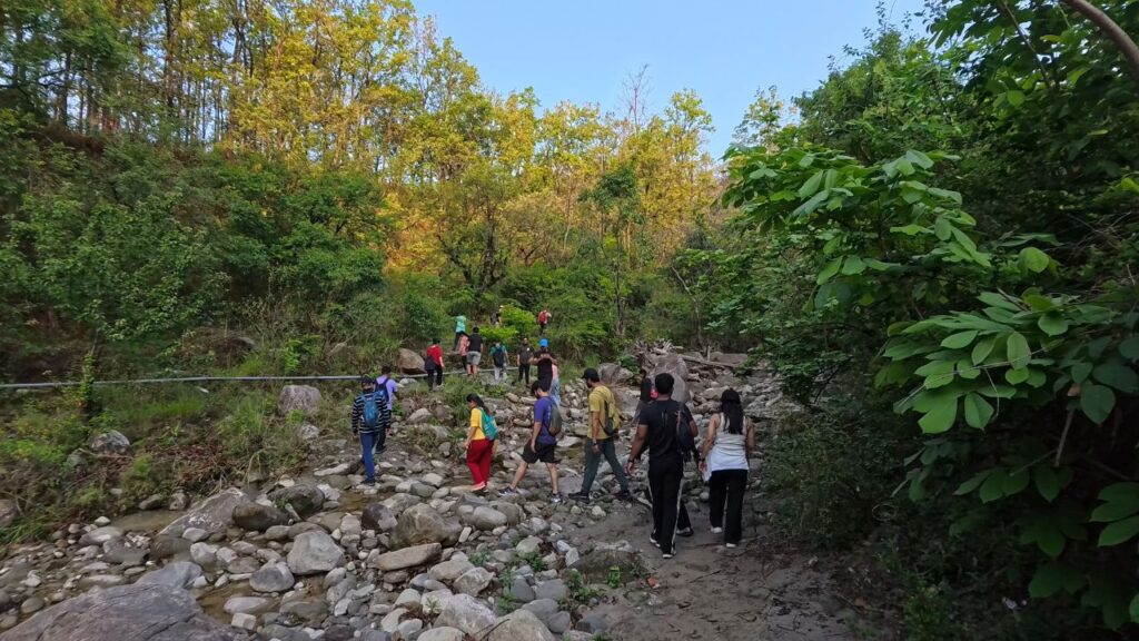 stream crossing Santala Devi Temple trek jungle